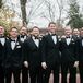 Groomsmen in Black Tuxedos with Rose Boutonnieres at Mansion Wedding
