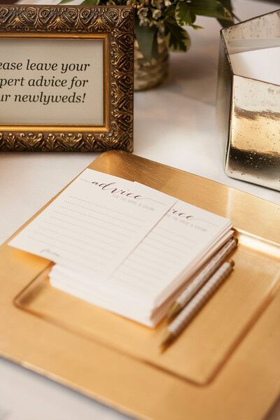 Taylor decorated her wedding in neutral hues of champagne and ivory paired with soft gold details.