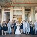The bridesmaids wore navy silk chiffon dresses from J. Crew, while the groomsmen wore light gray suits to match the soft pastel palette of the venue.