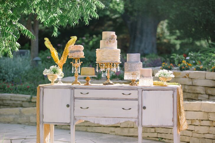 Knowing that the cakes would be outside, and loving the look of multiple, different size cakes, the couple decided to have faux cakes at their wedding. Five fake cakes were displayed on a vintage dresser while sheet cakes were inside, ready to be served.