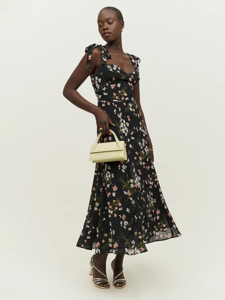Reformation fall floral bridesmaid dress with flowy midi skirt