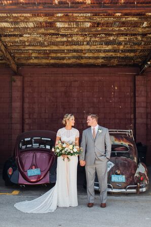 Bride and Groom With Vintage Cars