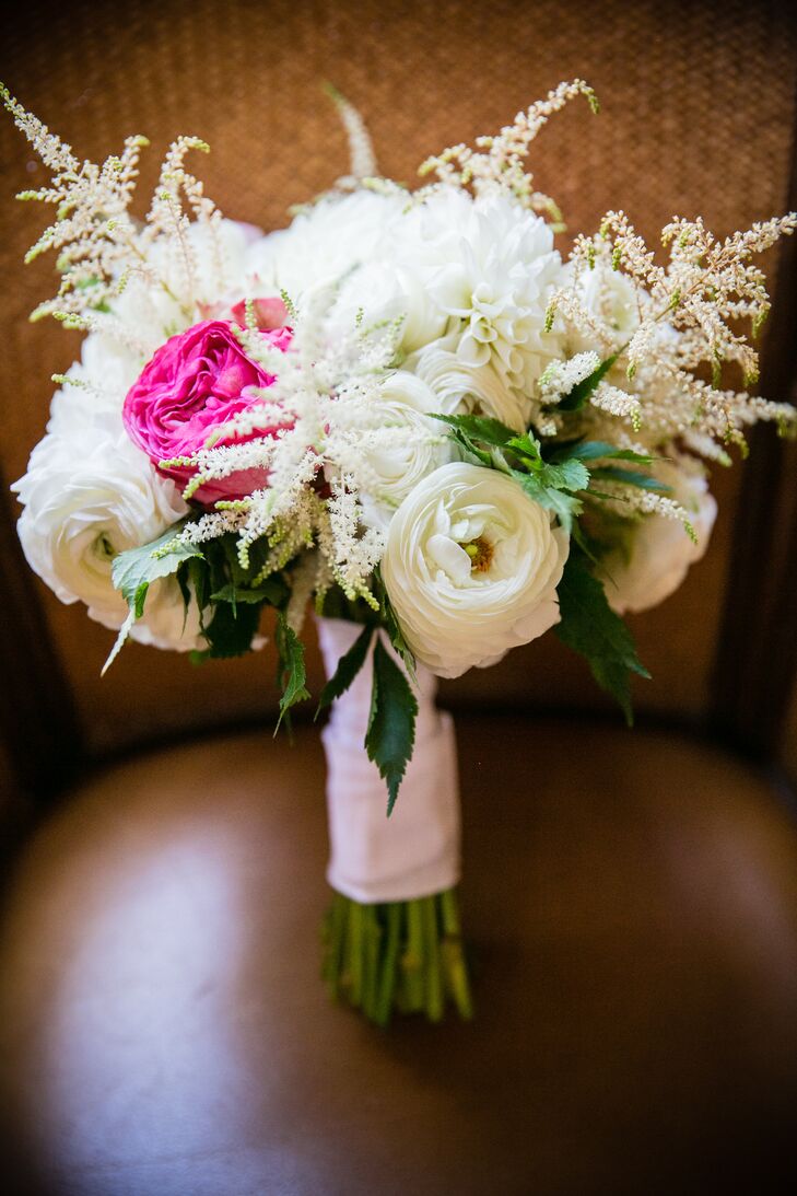 Caitlin's bouquet was smaller in size, but packed a punch with vibrant pops of fuchsia and textured, white astilbe flowers.