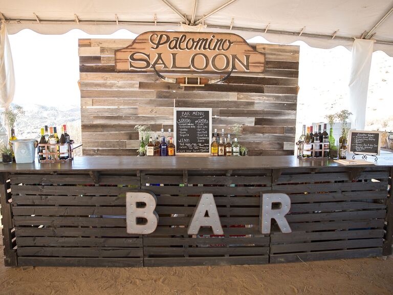 Rustic outdoor bar made of wood panels. 