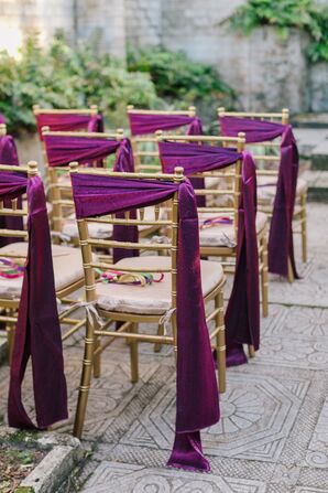Draped Purple Sashes Tied Around Chairs