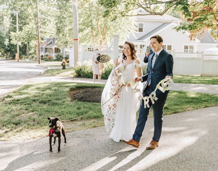Couple Walking Dog During Backyard Minimony in Reading, Massachusetts