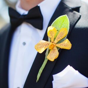 Yellow Orchid Boutonniere