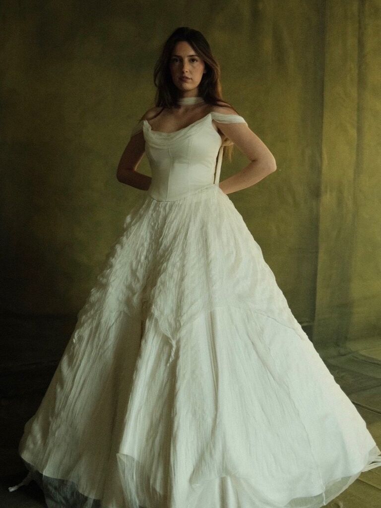 Avant-garde wedding dress with a full skirt by Cinq. 