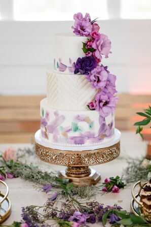 Round Tiered Cake with Purple Cake Flowers and Watercolor Accents