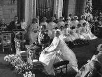 Prince Rainer and Grace Kelly during wedding ceremony.