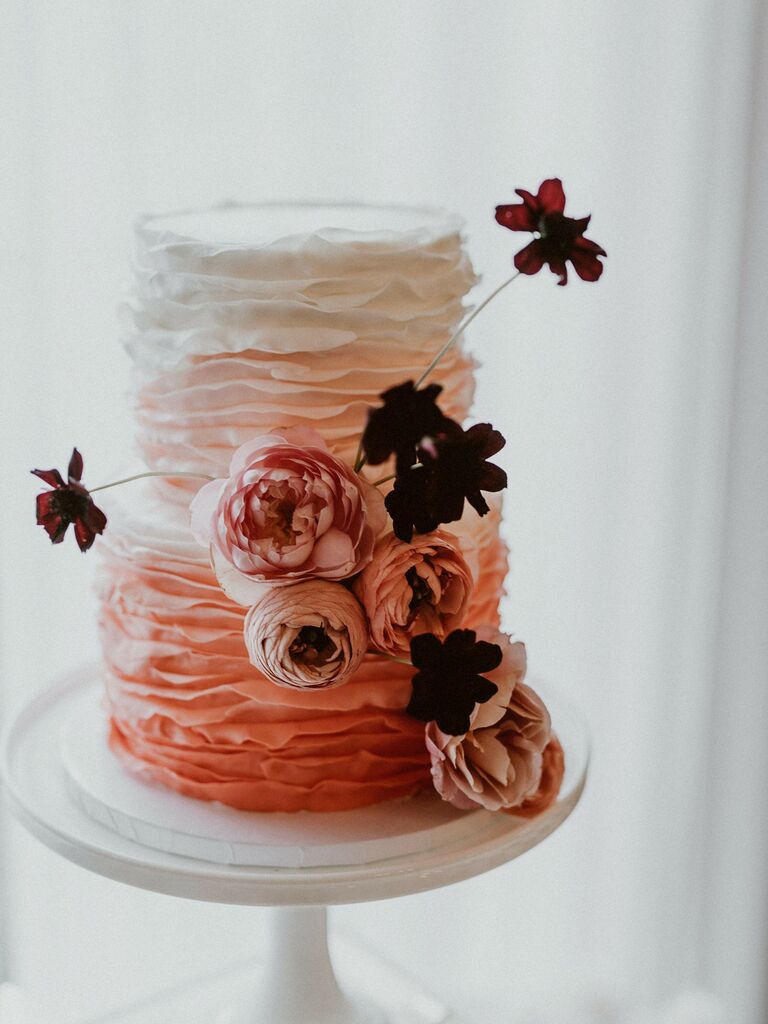 ombre wedding cake with pink ruffled buttercream