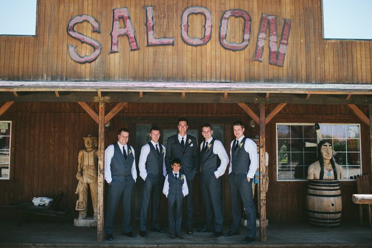 Brent's groomsmen's look was casual but elegant. They wore classic gray vests and pants paired with black ties.