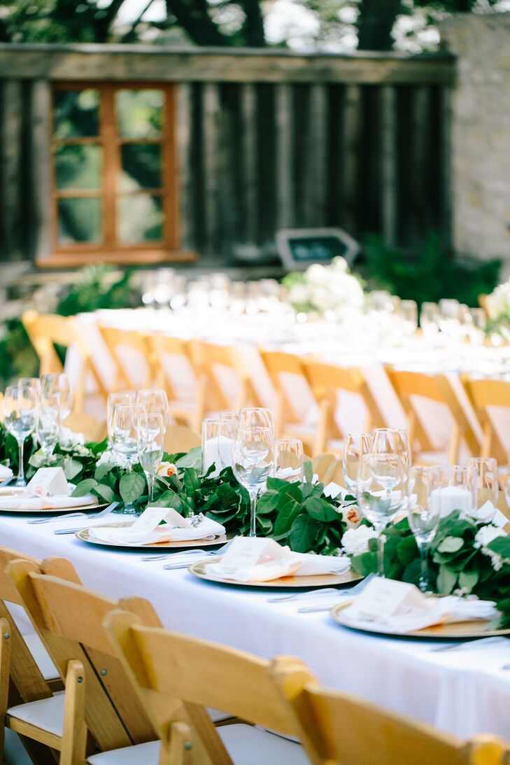 In October, Carmel Valley is golden all over as it's transitioning into the fall. The bride wanted to keep the decor romantic and clean so it wouldn't compete with the natural surroundings.  All of centerpieces were a variety of seasonal white flowers with big green leafing detail.