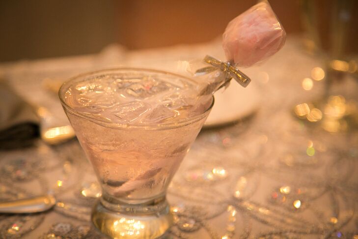 Kelli created a speciality cocktail recipe for a pink cotton candy martini, which had a cotton candy stick dipped into the drink.