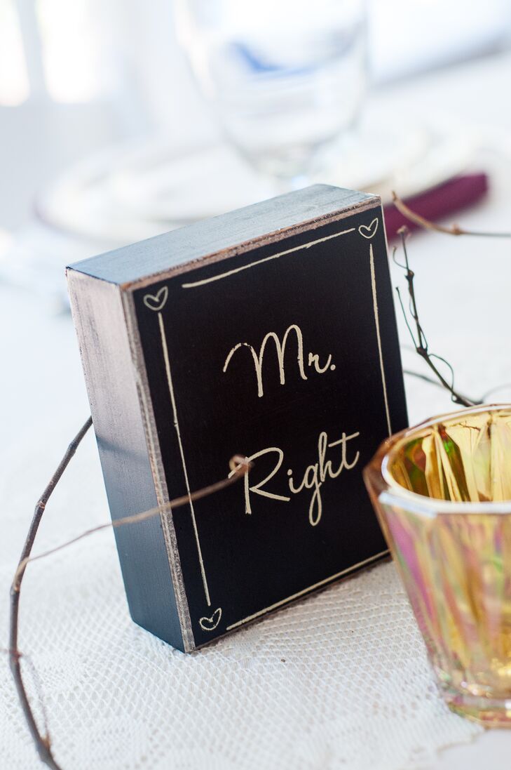 The groom and bride's seats were marked with signs labeled "Mr. Right" and "Mrs. Always Right."