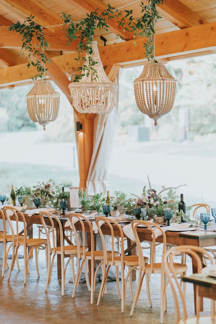 Bohemian Details on Tables at Wedding Reception