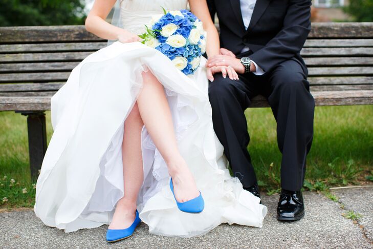 The bride looked for comfort when selecting her bold flats from Express that complemented the royal blue color palette.