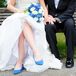 The bride looked for comfort when selecting her bold flats from Express that complemented the royal blue color palette.