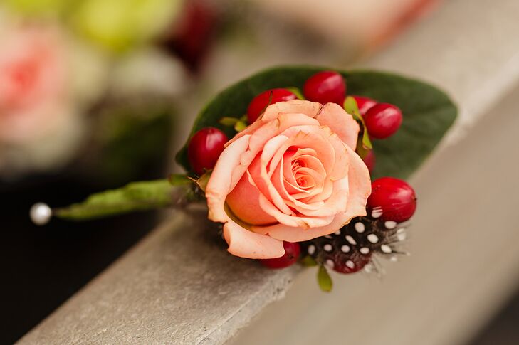 Coral Rose With Red Hypericum Berry Boutonniere