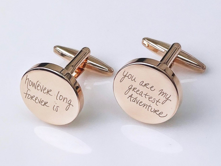 Round rose gold cuff links with 'however long forever is' and 'you are my greatest adventure' in handwriting