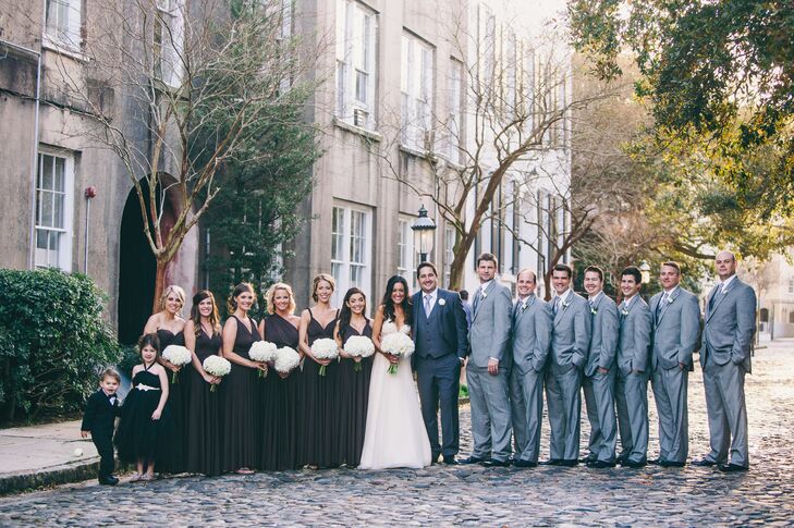 "We wanted a timeless-classic look for our wedding," Christina says. "We went with a black, white, off-white, gray and silver color scheme. I chose a slate gray bridesmaid dress by Dessy. The dress was able to be tied at the top in hundreds of different styles. I loved this option, because it was long and flattered all body types. Our groomsmen wore light gray suits."