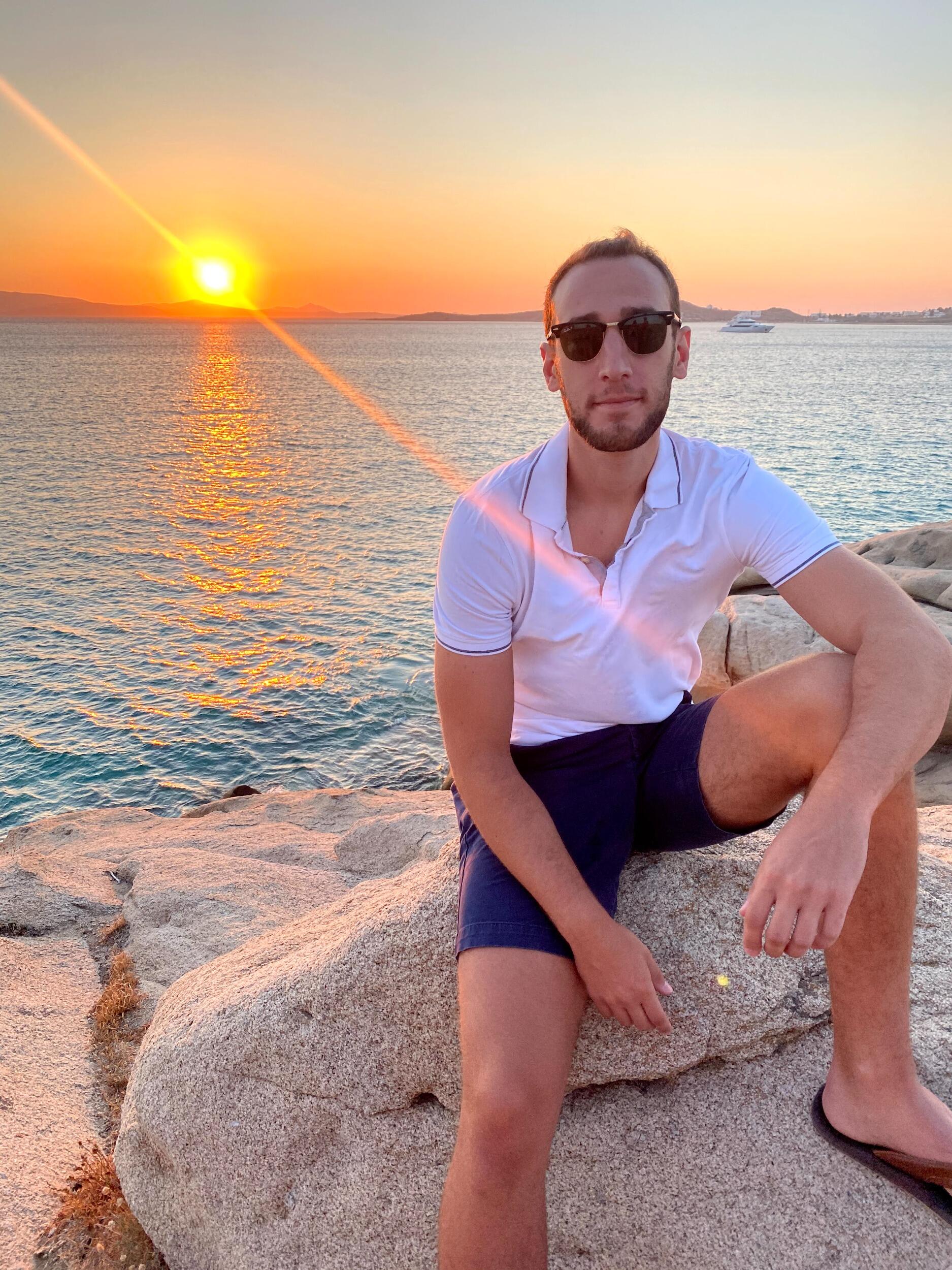 Adam's first time in Naxos. Sitting in the same spot he proposed 5 summers later!