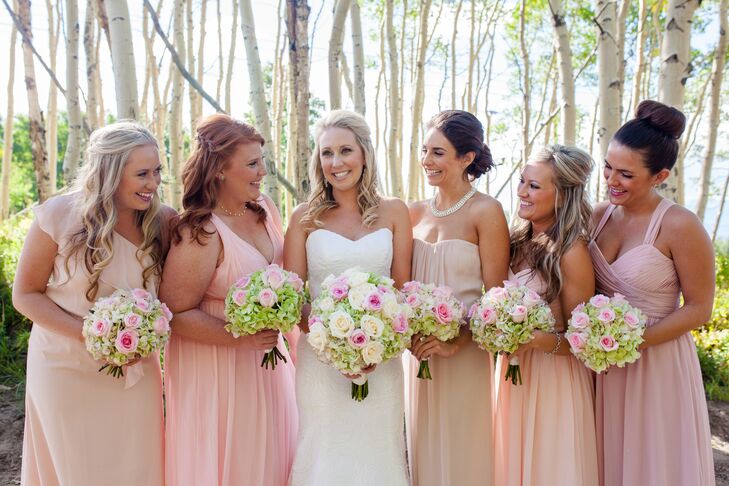 Ashley let the bridesmaids wear blush dress in whatever style they wanted and the house party wear champagne dresses in whatever style they wanted, too.