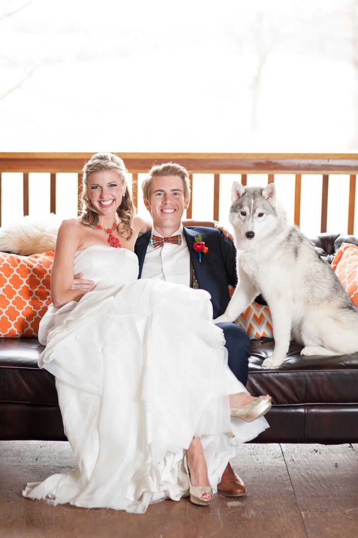 The couple's husky goes with them everywhere, and managed to get in a few of the couple's photos.