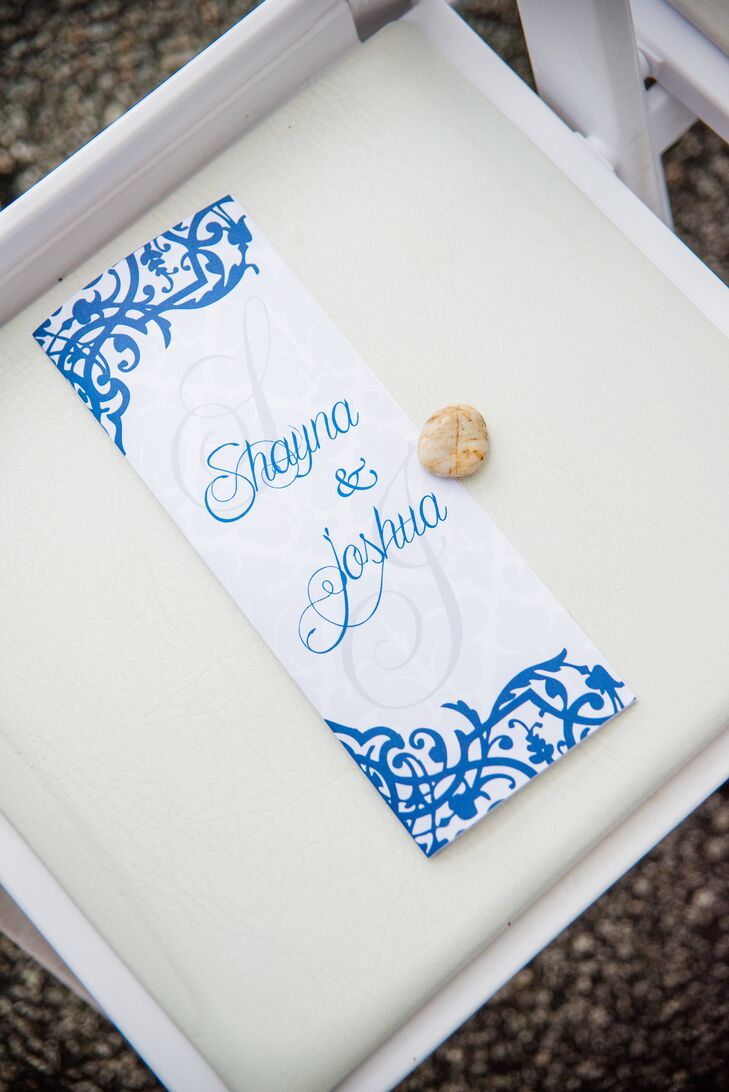 From the invitation suite to the programs, place cards, menus and beyond, each and every stationery element was designed and handcrafted by a dear family friend. She drew on the couple’s navy and white color palette for inspiration and used whimsical flourishes and Shayna and Josh’s monogram to give each design and elegant, personalized feel. “The only part she didn't play a hand in was our save-the-dates,” says Shayna, “which one of our very talented groomsman made for us.”