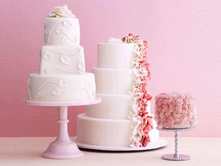 Pink and white tier wedding cake display 
