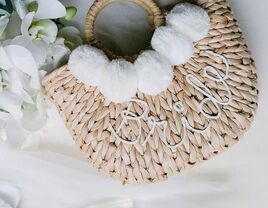 trendy straw "bride" tote with white pompoms