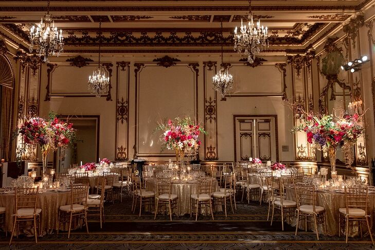 Glamorous Gold Reception with Tall Pink Centerpieces and Chandeliers