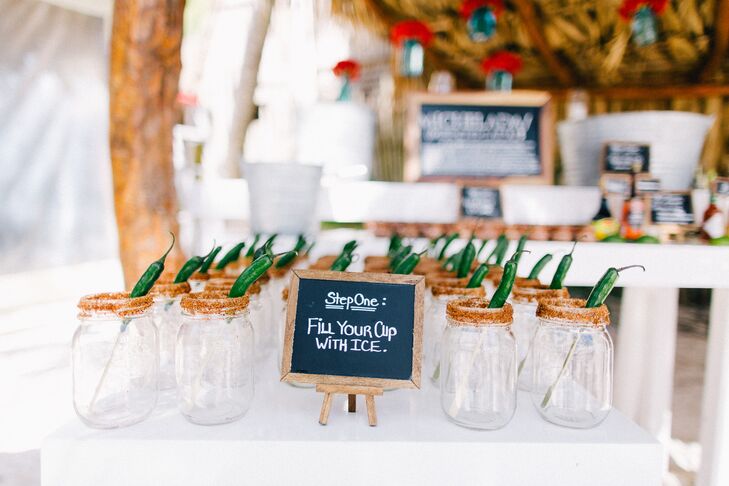 Danielle and Jason set up a Mexican-inspired cocktail bar, with mason jars lined with spices and a pepper. Guests could choose to fill the mason jar cocktail glasses with micheladas or strawberry margaritas.