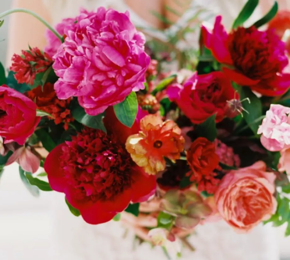 A large bouquet of red and pink flowers.