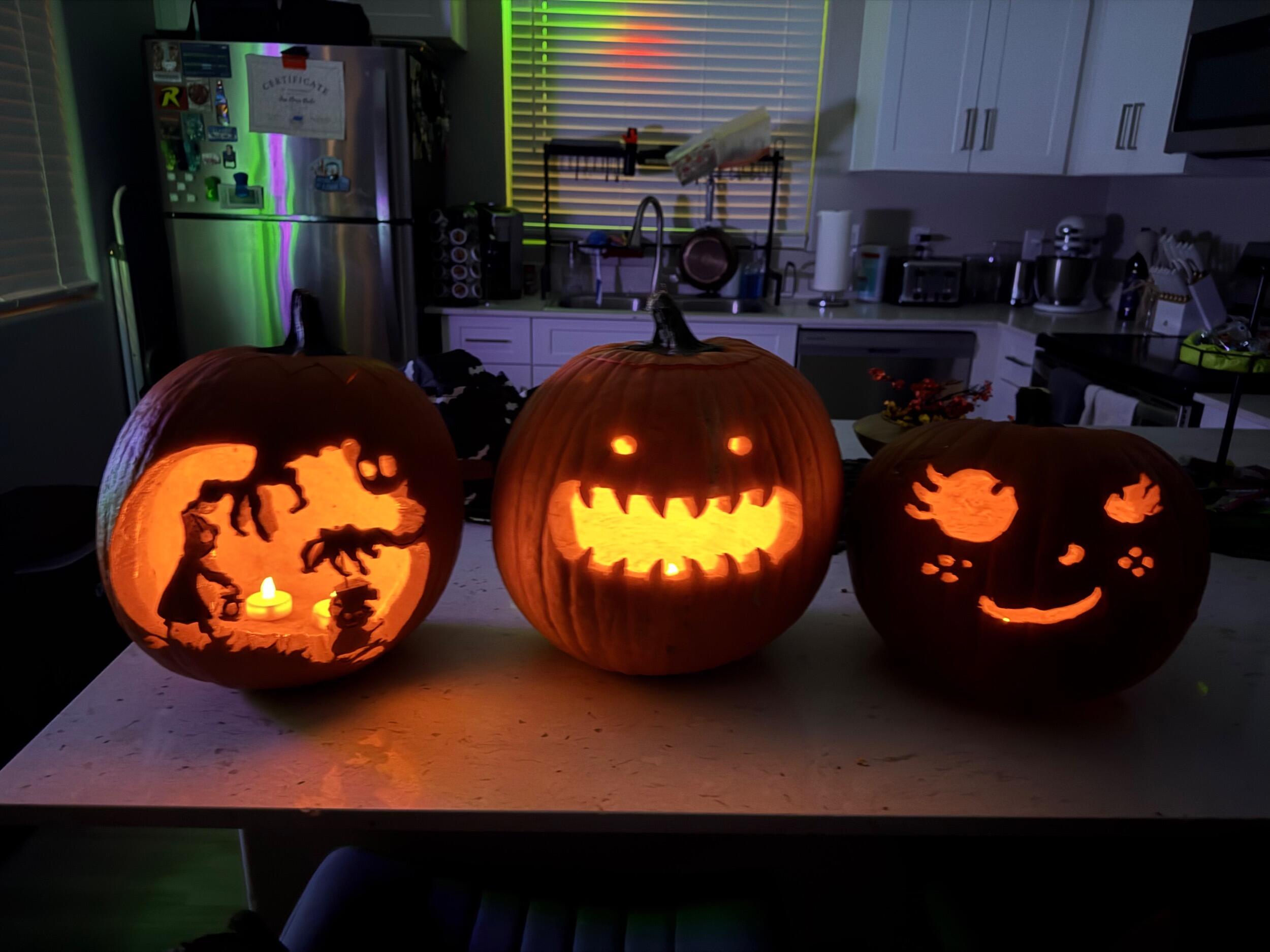 We got into the Halloween spirit last weekend with some pumpkin carving and Haunted Mansion. From left to right, the pumpkins respectively belong to Alanah, Jose, and his mom (also named Sarah).