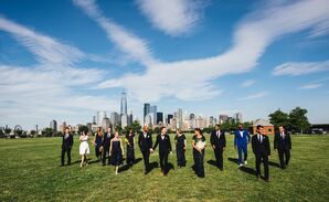 Grooms and Wedding Party in Front of NYC Skyline