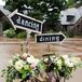 As an adorable décor addition, a metal bicycle decked out with flowers and chalkboard signs directed guests to the dinner and dancing.