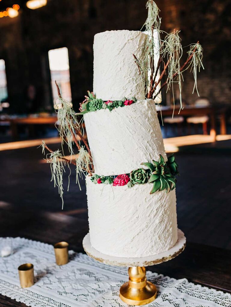 Wedding cake with tilted tiers and Spanish moss