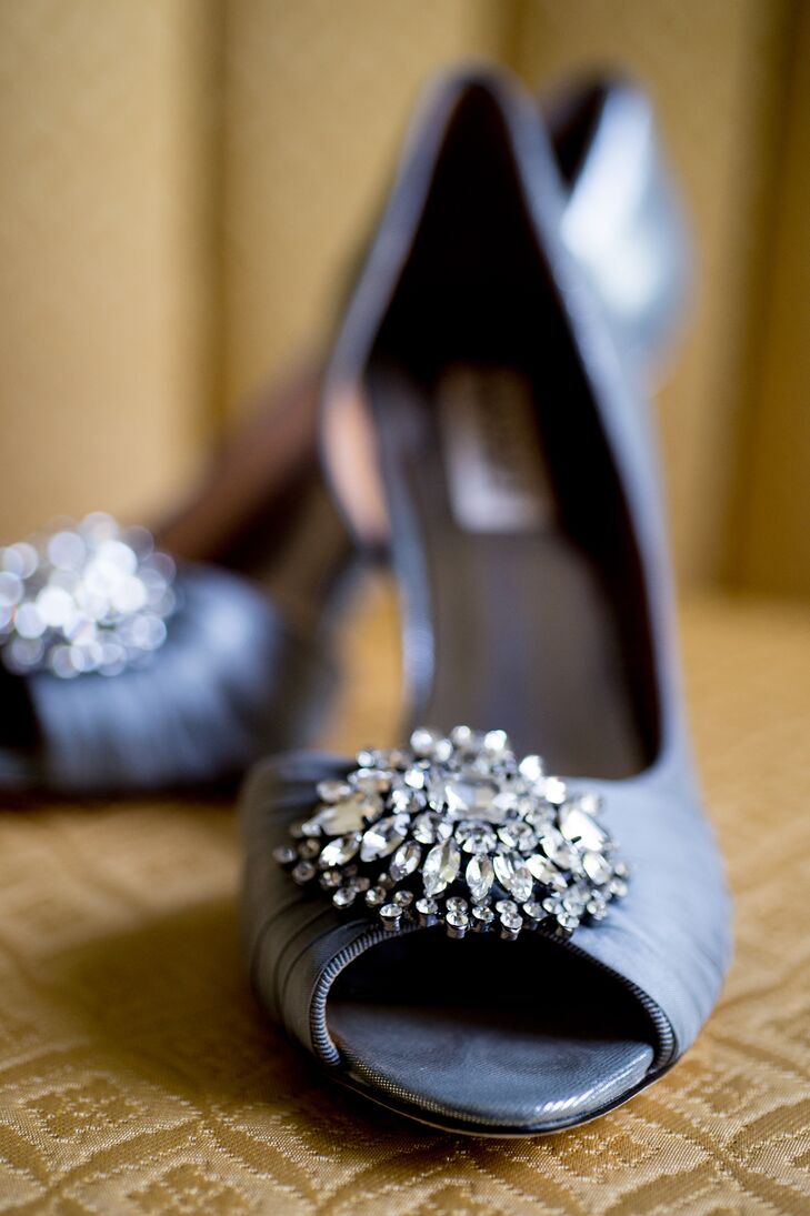 Lisa chose silver gray heels by Badgley Mischka Pearson for their comfort and crystal detail, which complimented her marquee crystal earrings by BHLDN and crystal clustered belt.