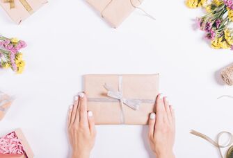 wrapped gift with grey ribbon