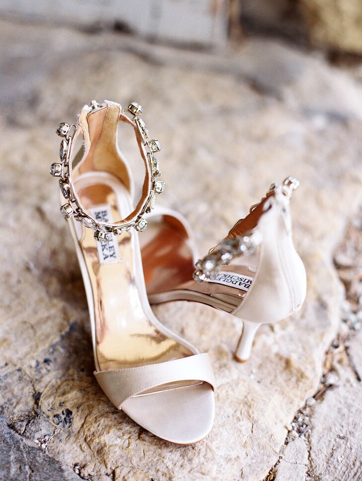 To give her look a subtle hint of glam, Kristina wore a pair of champagne Badgley Mischka sandals with crystal-embellished ankle straps for her walk down the aisle.