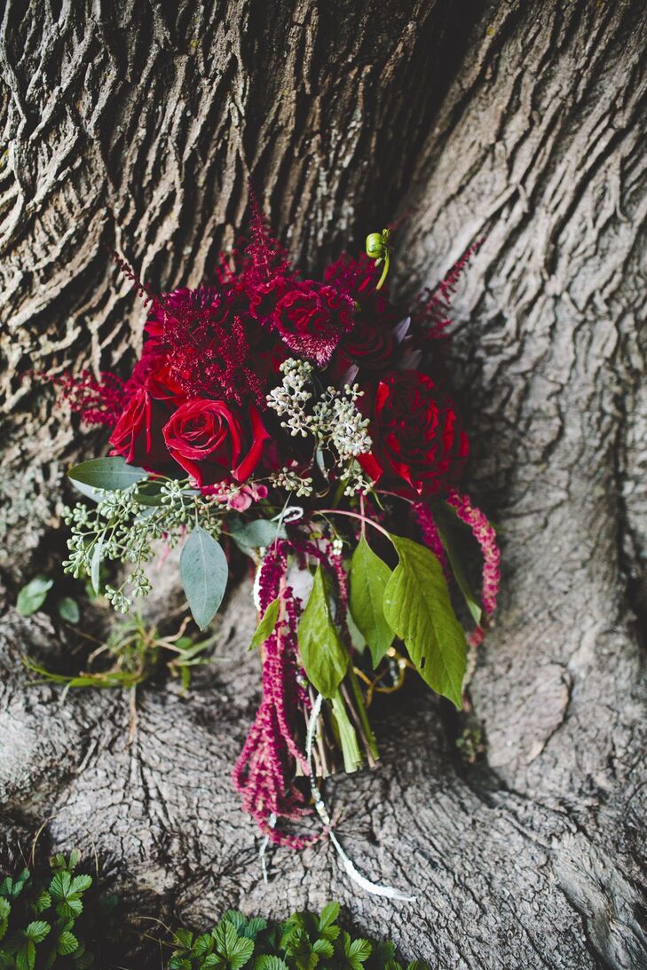 Julie wanted her bouquet to be a huge spray of rich red flowers dripping with amaranthus and her florist certainly delivered! The result was a bold combination of garden roses, dahlias, hydrangeas, astilbe and celosia, with plenty of amaranthus adding texture.
