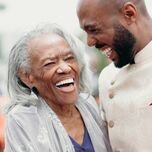 Mother and son dancing at wedding 