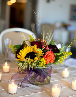 Small Fall-Colored Centerpieces with Sunflowers and Votive Candles