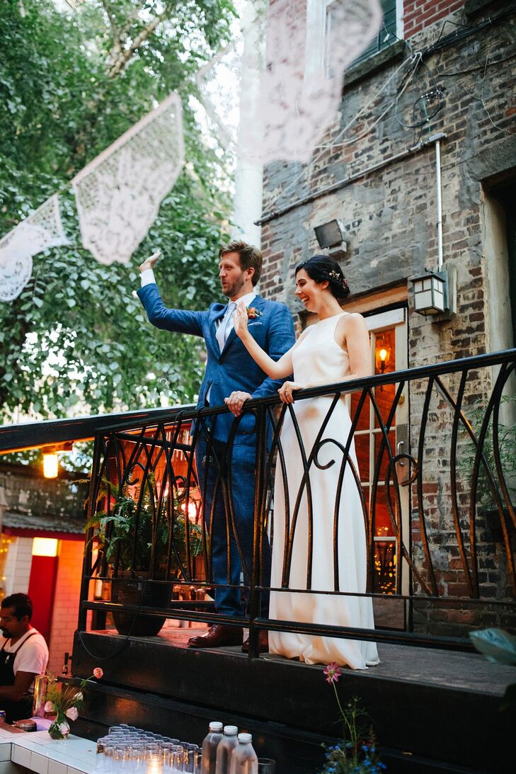 Modern Couple with Simple Column Dress and Blue Suit