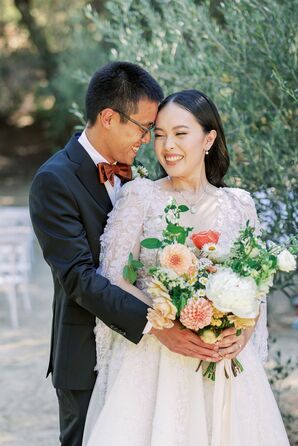 Bride and Groom Sharing Hug