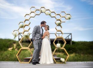 Rebecca Ende (34) and Drew Lichtenberg (32) met at a theater performance, prompting them to host a modern beach fete filled with geometric patterns, s