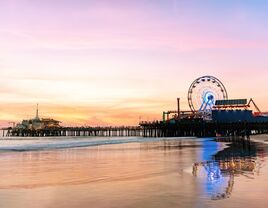 The Santa Monica Pier at sunset, Los Angeles, California.