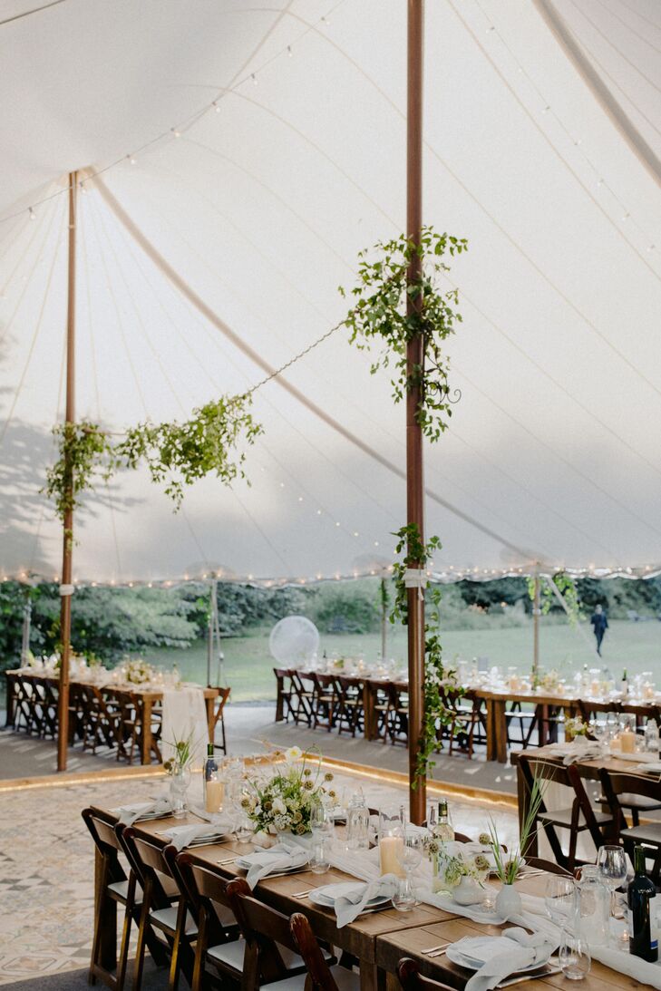 Tented Reception with Farm Tables and Greenery