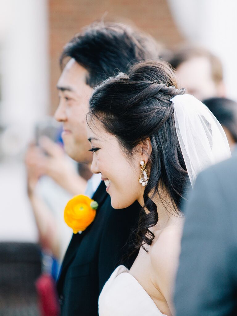 half up wedding hairstyle for short hair with twists and veil